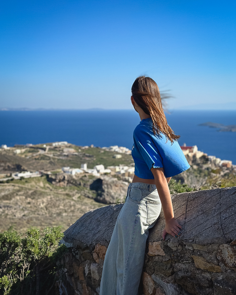 Girl on the Alithini hike with view over Ano Syros