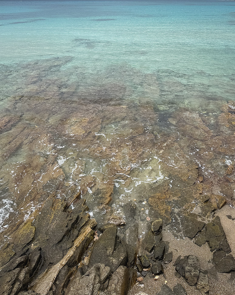 crystal blue water at fanoremi beach in AntiParos