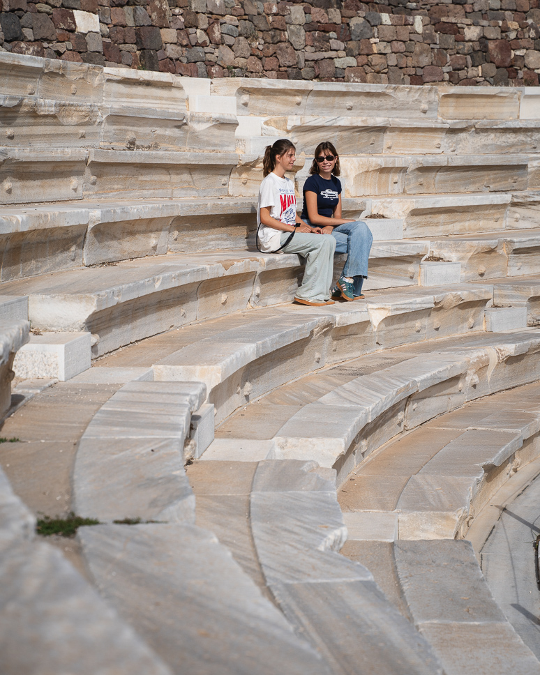 waiting at the Ancient Roman theater in Milos