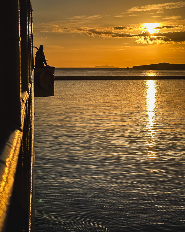 View of the sunrise from the Artemis ferry in Ermoupoli Syros