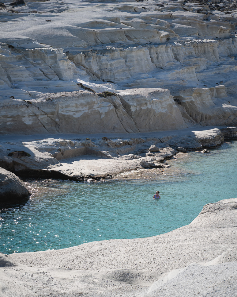 swimming at sarakiniko beach in Milos